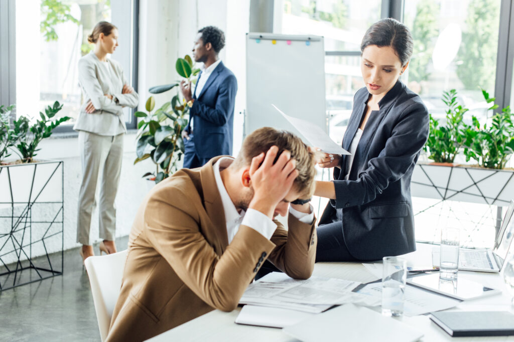 Mental Health - multiethnic businesspeople in formal wear at conference in office